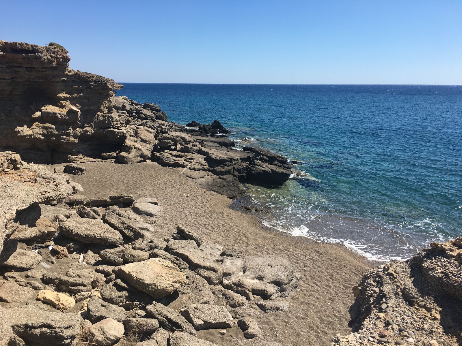Psalidi beach'in fotoğrafı çakıl ile kum yüzey ile