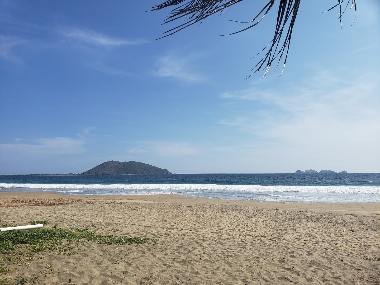 Foto von Playa Larga Zihuatanejo mit langer gerader strand
