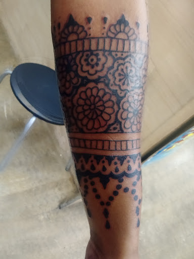 Tattoo Shop «Infinite Ink Tattoo & Piercing», reviews and photos, 207 E 9th St, Hopkinsville, KY 42240, USA