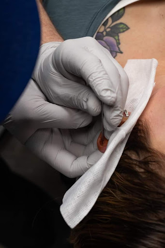 Explore love symbol tattoo ideas, creative tattoo ideas in Sioux City, available at Painless Body Piercing