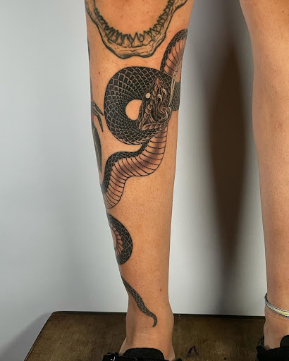 Find cat tattoo ideas simple for your next unique tattoo in Kissimmee at Fallen Sparrow Tattoo Co