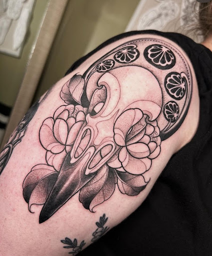 Find guy best friend tattoo ideas for your next unique tattoo in Boulder at Claw and Talon Tattoo
