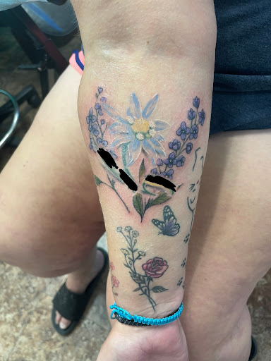 Explore pinup tattoo ideas, creative tattoo ideas in Lufkin, available at Blue Lotus Tattoo & Piercing