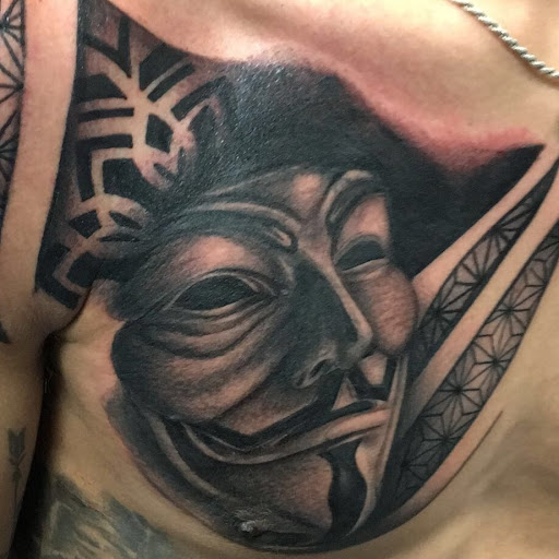 Explore wrestling tattoo ideas, creative tattoo ideas in Tallahassee, available at Studio B Tattoos and Piercings