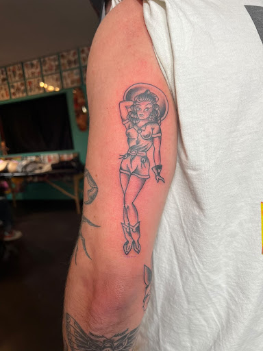 Explore tanning tattoo ideas, creative tattoo ideas in San Diego, available at Sideshow Tattoo and Piercing