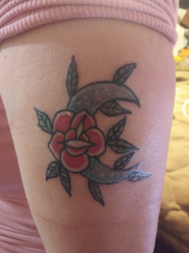 Explore religious elbow tattoo ideas, creative tattoo ideas in Newport, available at Dead On Ta2s