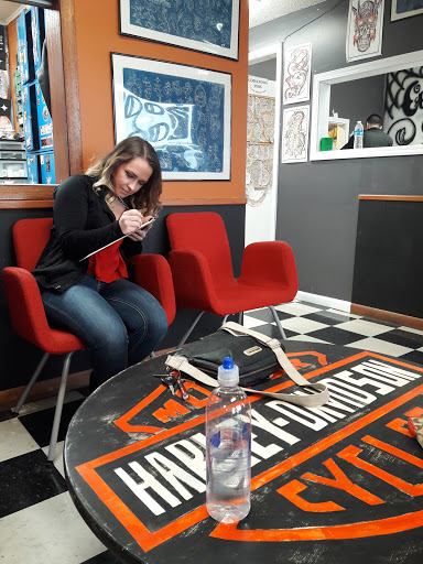 Explore forearm cross tattoo ideas, creative tattoo ideas in Enid, available at Omocke Ink