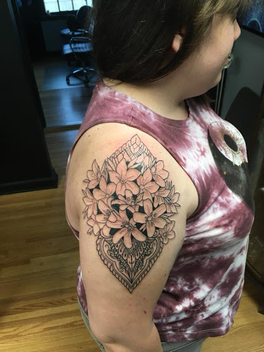Explore cover up tattoo ideas female back, creative tattoo ideas in Elk River, available at Subjective Art Tattoo, LLC