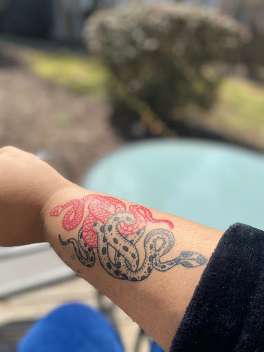 Find gym tattoo ideas for men for your next unique tattoo in Hadley at Blueprint Gallery