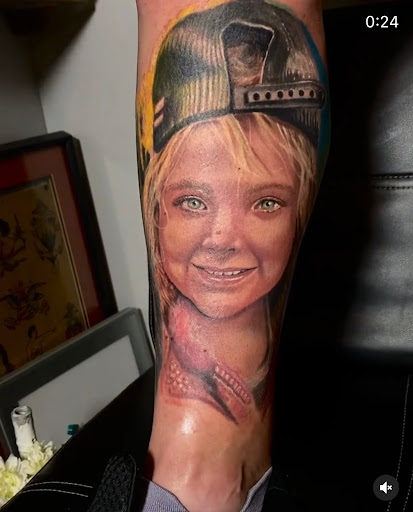 Find angel tattoo ideas for guys for your next unique tattoo in Fort Wayne at Grade A Tattoos and Body Piercing