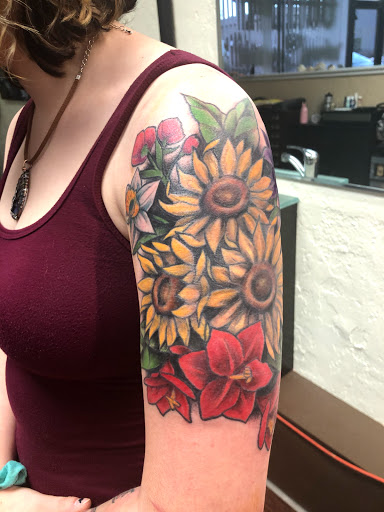 Explore koi sleeve tattoo ideas, creative tattoo ideas in Littleton, available at Living Canvas Tattoo and Piercing