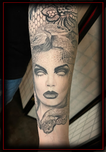 Explore musical tattoo ideas, creative tattoo ideas in Omaha, available at Eternal Tattoo & Body Piercing - Omaha