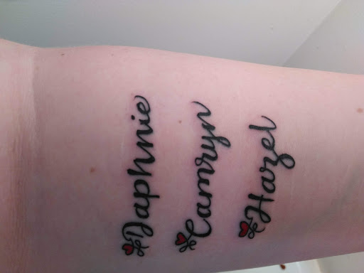 Explore dominican flag tattoo ideas, creative tattoo ideas in West Branch, available at Northstar Tattooz