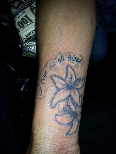 Explore symbol small tattoo ideas, creative tattoo ideas in Laurel, available at Ambitious Creations Tattoo and Piercing Studio