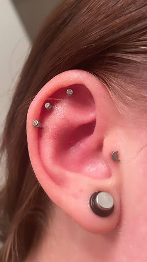 Explore fish tattoo ideas for females, creative tattoo ideas in Lufkin, available at Blue Lotus Tattoo & Piercing