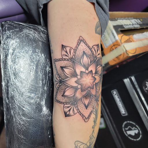Explore tattoo cover up ideas for ring finger, creative tattoo ideas in Easley, available at Peach Pit Tattoo