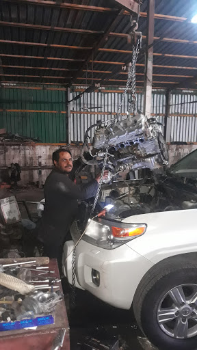 ورشة الامل الفنية لصيانة السيارات 