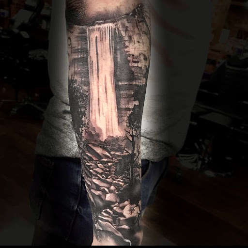 Explore thigh flower tattoo ideas, creative tattoo ideas in San Diego, available at SD Tattoo