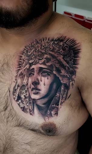 Explore mad hatter tattoo ideas, creative tattoo ideas in Orange, available at Three Diamonds Tattoo