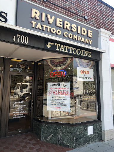 Explore female tattoo ideas for lower back, creative tattoo ideas in Cambridge, available at Riverside Tattoo Company