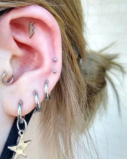 Explore tattoo ideas for cosmetologist, creative tattoo ideas in Libertyville, available at Lucky Seven Tattoo