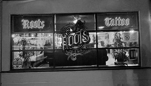 Explore cover up tattoo ideas for upper arm, creative tattoo ideas in Beaumont, available at Roots Tattoo Studio