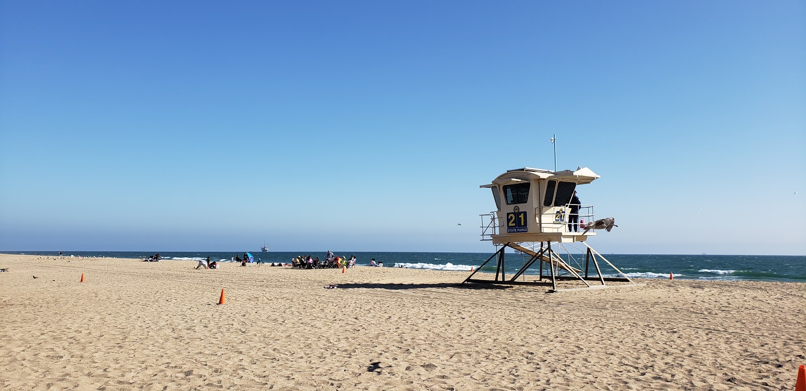 Fotografija Bolsa Chica Beach z dolga ravna obala