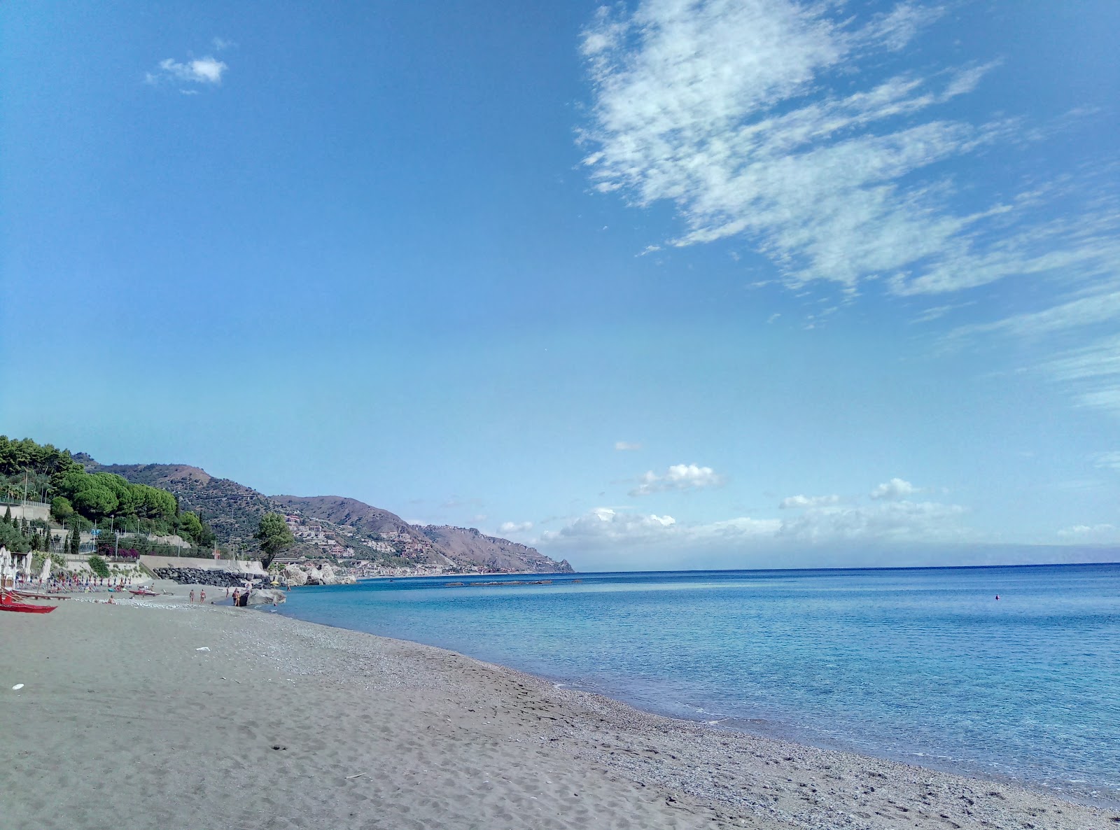 Foto av Spiaggia Lido Re del Sole med beige sand och småsten yta