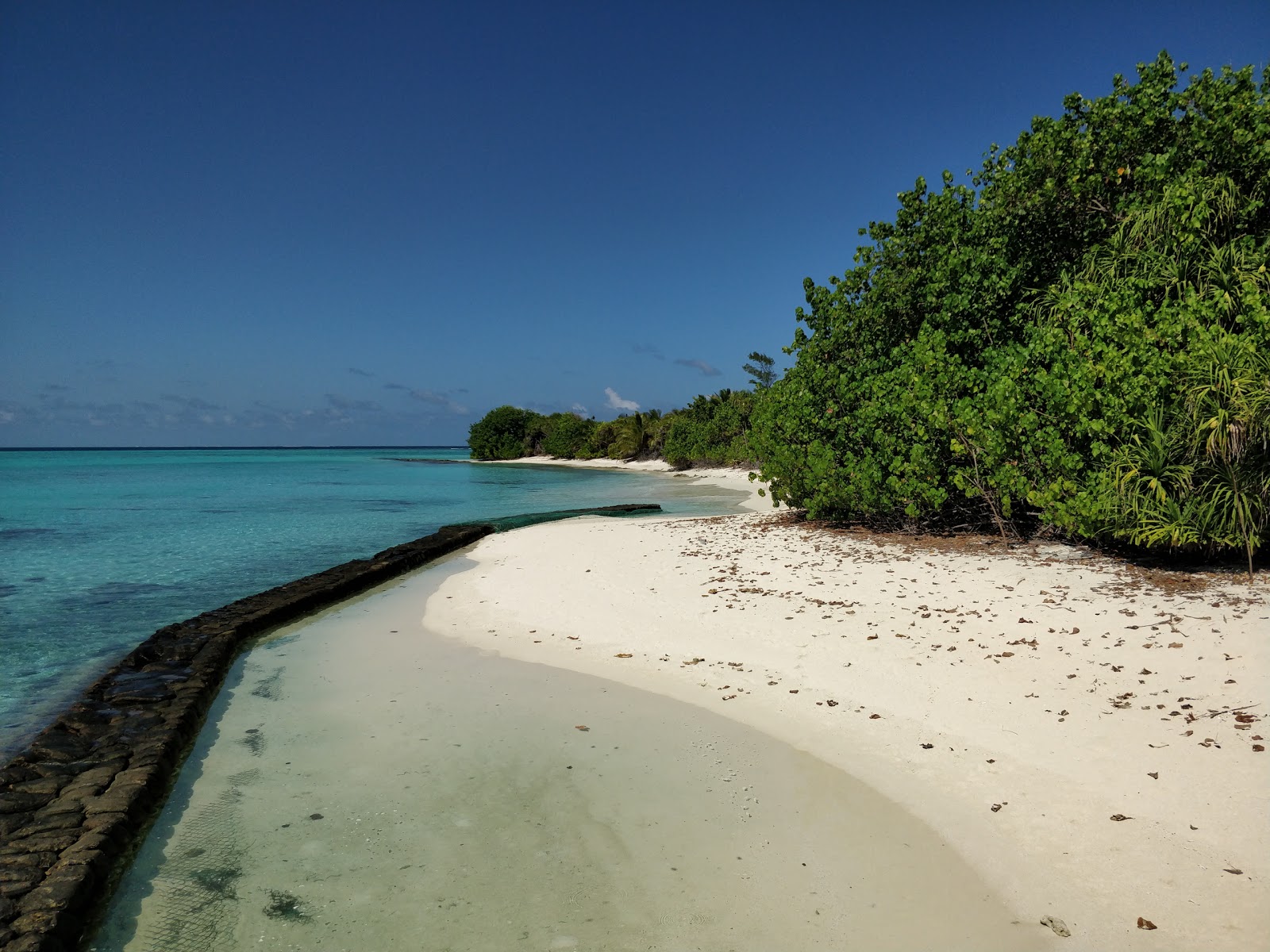 Foto di Rasfari island con una superficie del sabbia bianca
