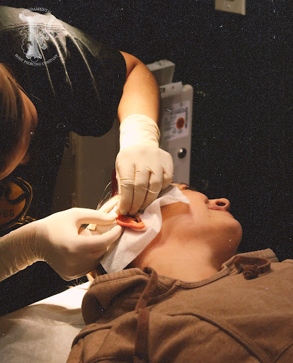 Explore face tattoos above eyebrow tattoo ideas, creative tattoo ideas in Chicago, available at Fundamental Body Piercing