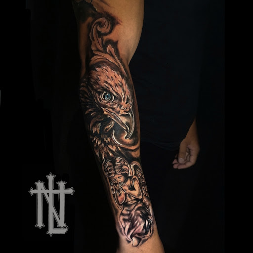 Logo da empresa - New Look Tattoo