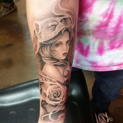 Explore rip tattoo ideas for guys, creative tattoo ideas in San Angelo, available at Inkland Tattoo Studio