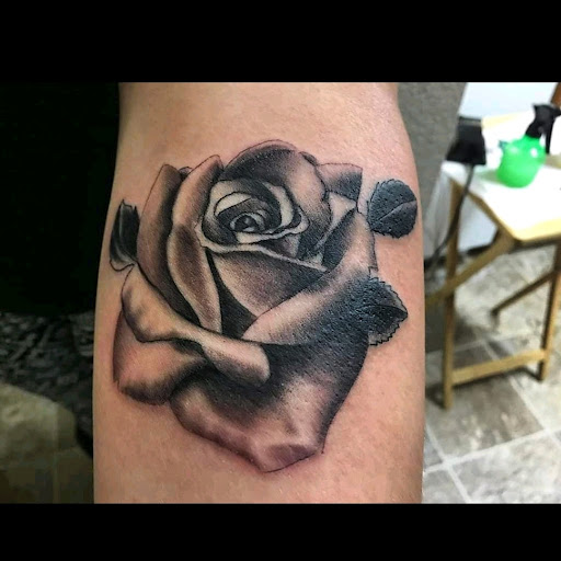 Explore undertaker tattoo ideas, creative tattoo ideas in Vancouver, available at Studio X Tattoos & Piercings