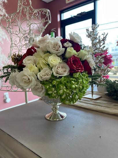 Blooms & Tomato Floral Boutique