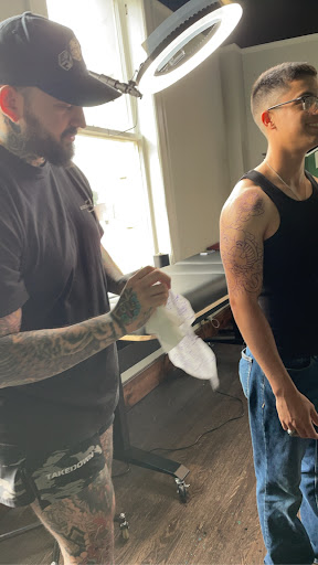 Explore dolphin tattoo ideas for females, creative tattoo ideas in Universal City, available at Unbroken Club