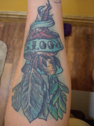 Explore spine tattoo cover up ideas, creative tattoo ideas in Helena, available at Velvet Rose Tattoo