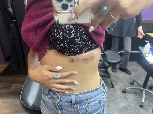 Explore highland cow tattoo ideas, creative tattoo ideas in Denver, available at Sacred Soul Tattoo