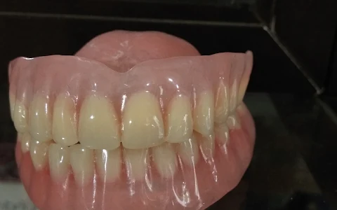 Pasang gigi Rizal Dental image