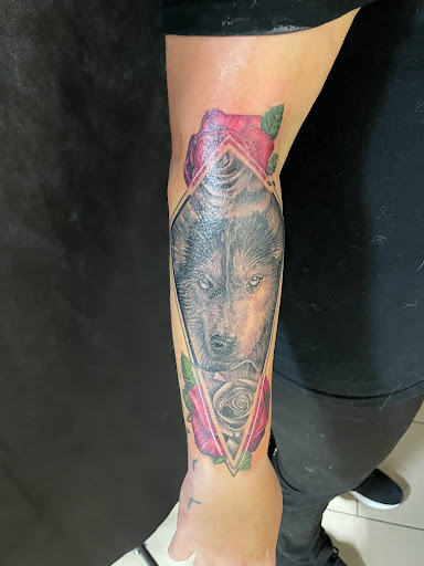 Explore neck tattoo ideas for women, creative tattoo ideas in Sarasota, available at SEVEN SINS Tattoo Studio