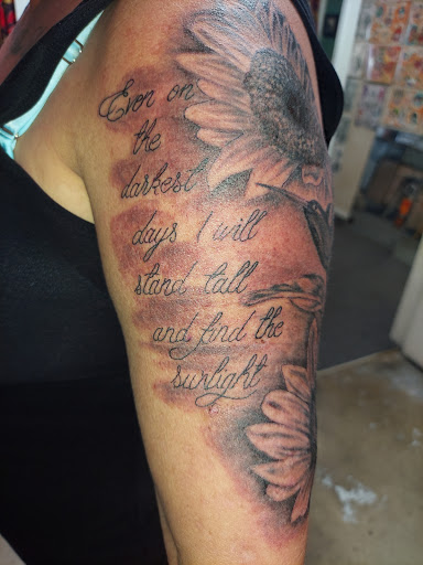 Explore pansy tattoo ideas, creative tattoo ideas in Odessa, available at Little Dragon Tattoos Studio