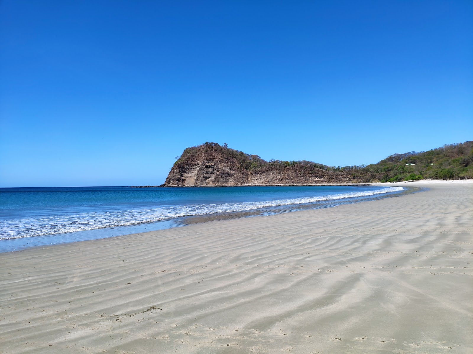 Foto de Playa La Flor con gran bahía