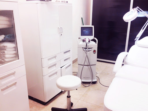 Explore hand skull tattoo ideas, creative tattoo ideas in Bayside, available at Laser Goddess