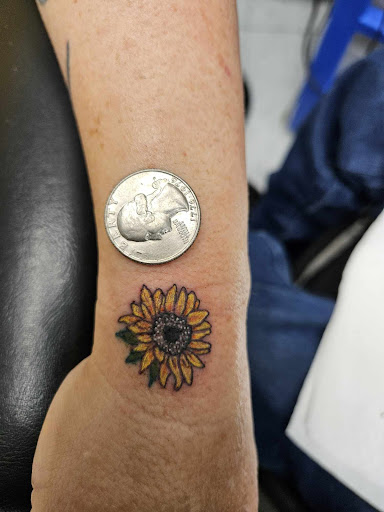 Explore y2k tattoo ideas, creative tattoo ideas in Salem, available at Outwest Tattoo and body piercing ,30 years of tattooing,only life time guarantee