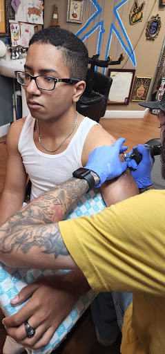 Explore card tattoo ideas, creative tattoo ideas in Saint Marys, available at WarHawk Tattoo Company ST MARYS