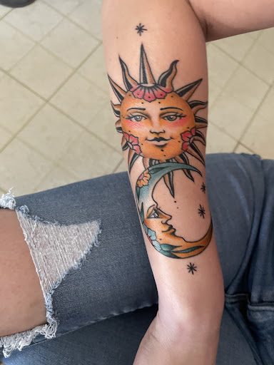 Explore backpiece tattoo ideas, creative tattoo ideas in Orange, available at Black Palm Tattoo