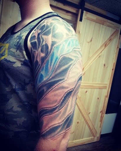 Explore puzzle tattoo ideas, creative tattoo ideas in Sioux City, available at Thorn-Side Tattoo & Piercing