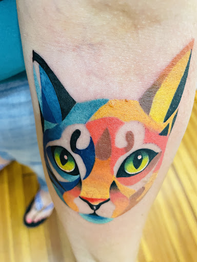 Explore lion and the lamb tattoo ideas, creative tattoo ideas in Frederick, available at Time Bomb Tattoos & Curiosities