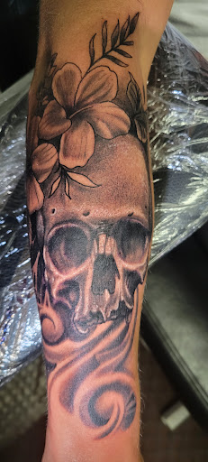 Explore alternative tattoo ideas, creative tattoo ideas in Angola, available at Hoodlum Ink