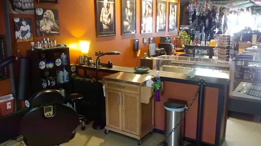 Explore alpha male tattoo ideas, creative tattoo ideas in Portsmouth, available at River City Tattoos