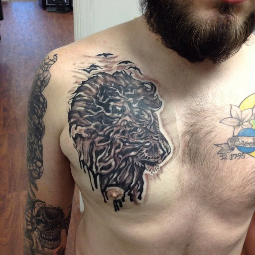 Explore daffodil tattoo ideas, creative tattoo ideas in Seymour, available at American Gypsy Tattoo Corp.